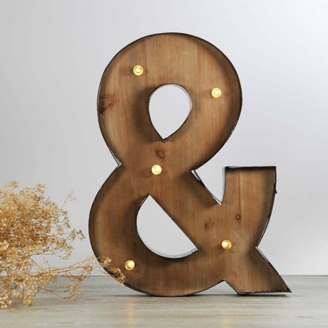 Letra ampersand luminosa
