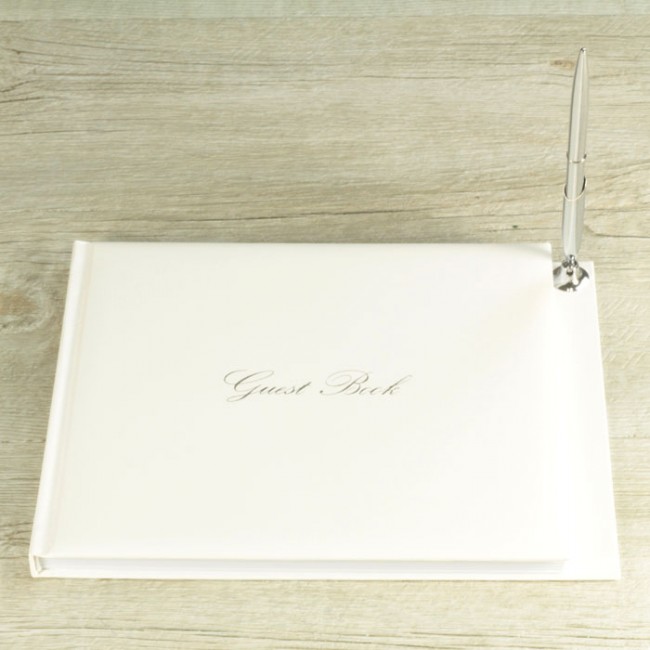 Libro de firmas blanco con bolígrafo